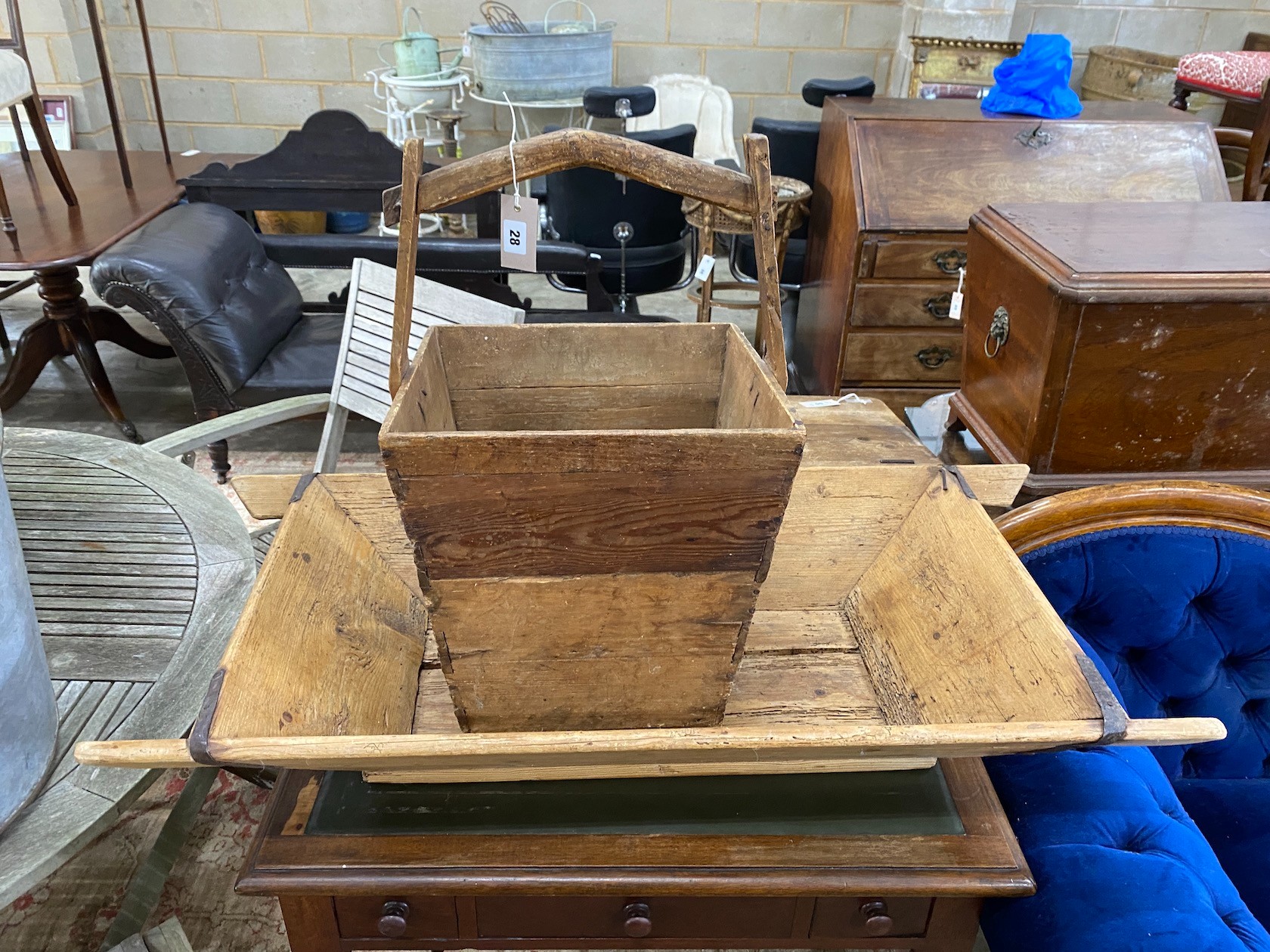 A 19th century iron bound rectangular pine dough bin, width 104cm, depth 49cm together with a square pine bucket, height 58cm